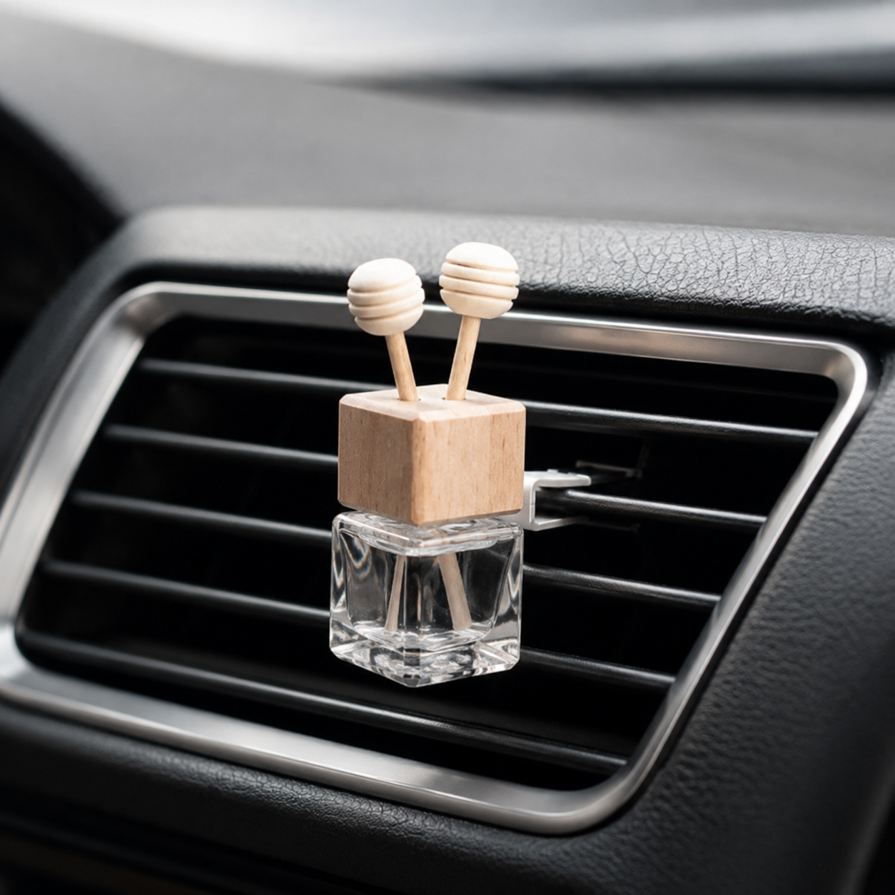 Car air freshener with wooden design on a car vent