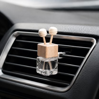 Car air freshener with wooden design on a car vent
